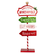 Vertical metal Christmas sign in festive colours, 23x9x57cm, ideal for entryways and seasonal displays