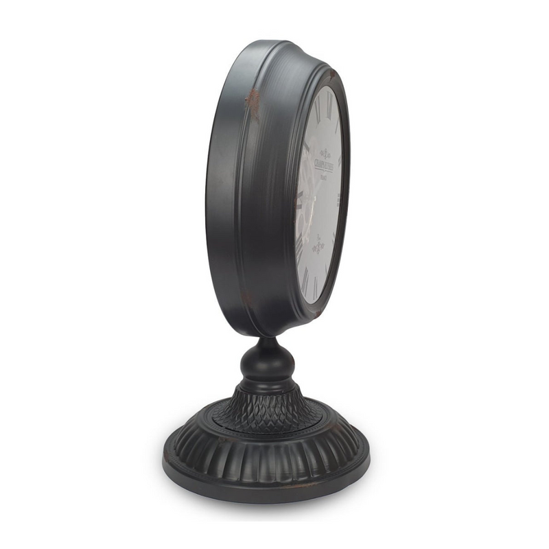 Black metal table clock with rotary gear design, 54cm tall