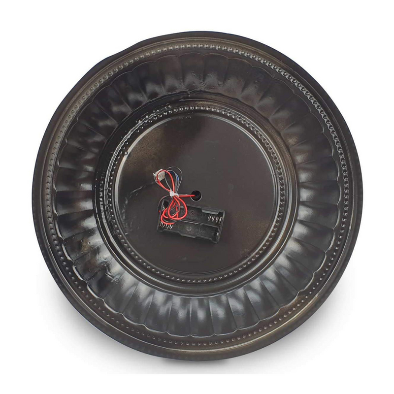 Black metal table clock with rotary gear design, 54cm tall