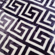 Close-up of a textured fabric with a geometric pattern