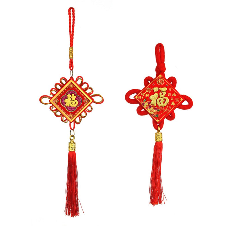 Auspicious hanging token with traditional knot work in red and gold