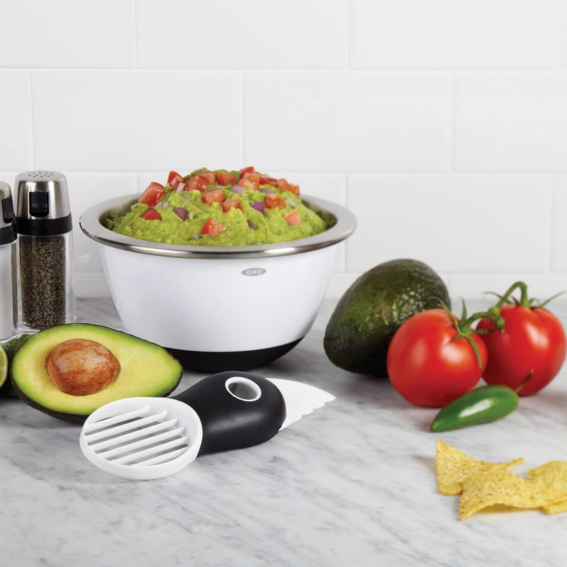 OXO Good Grips 3-in-1 Avocado Slicer with green blade and stainless steel pitter