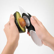 OXO Good Grips 3-in-1 Avocado Slicer with green blade and stainless steel pitter