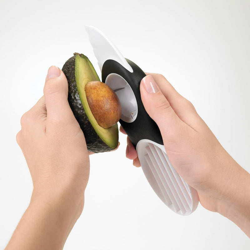 OXO Good Grips 3-in-1 Avocado Slicer with green blade and stainless steel pitter