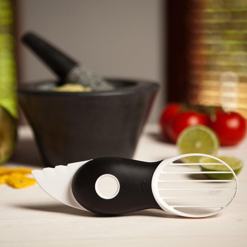 OXO Good Grips 3-in-1 Avocado Slicer with green blade and stainless steel pitter