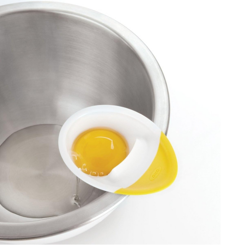 OXO Good Grips 3-in-1 Egg Separator with bowl hook, raised cracking edge, and non-slip grip for easy egg prep.