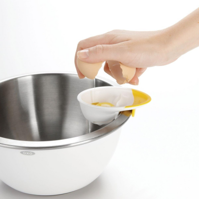 OXO Good Grips 3-in-1 Egg Separator with bowl hook, raised cracking edge, and non-slip grip for easy egg prep.