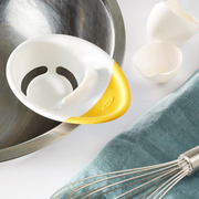 OXO Good Grips 3-in-1 Egg Separator with bowl hook, raised cracking edge, and non-slip grip for easy egg prep.
