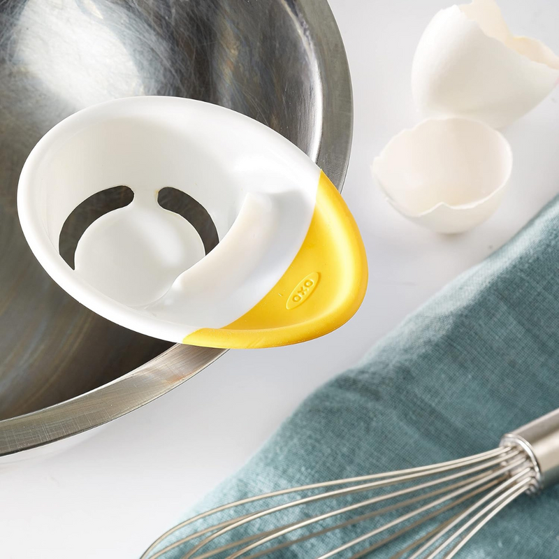OXO Good Grips 3-in-1 Egg Separator with bowl hook, raised cracking edge, and non-slip grip for easy egg prep.