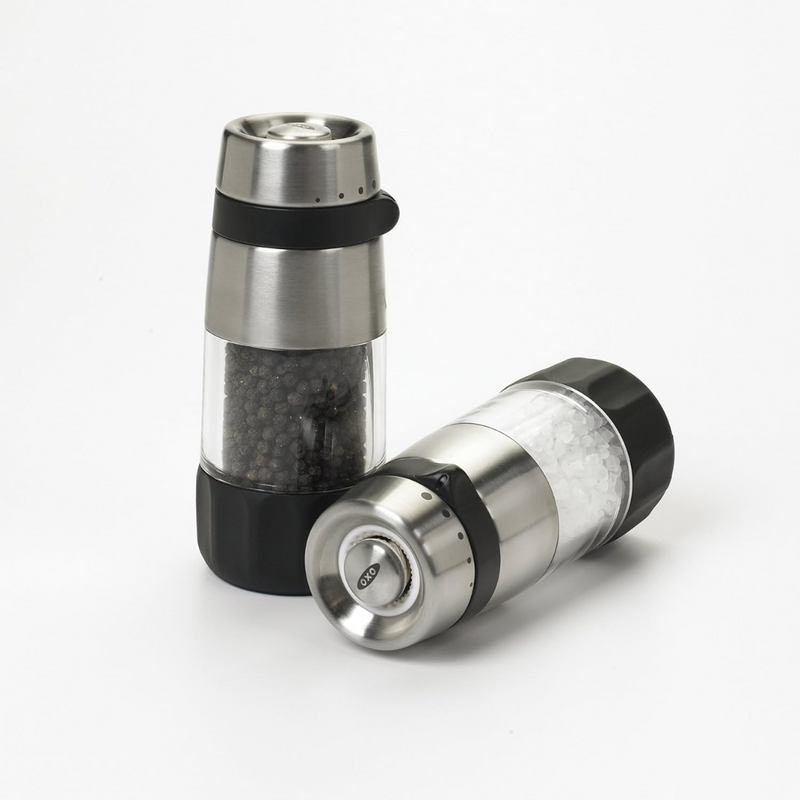 OXO Good Grips Accent Mess-Free Salt and Pepper Grinder Set with adjustable ceramic grinders and stainless steel accents.