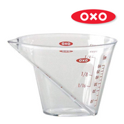 OXO Good Grips Mini Angled Measuring Cup with top-down measurement markings and soft non-slip handle.