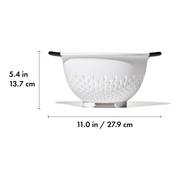 OXO Good Grips Colander with perforated holes, elevated base, and soft non-slip handles.