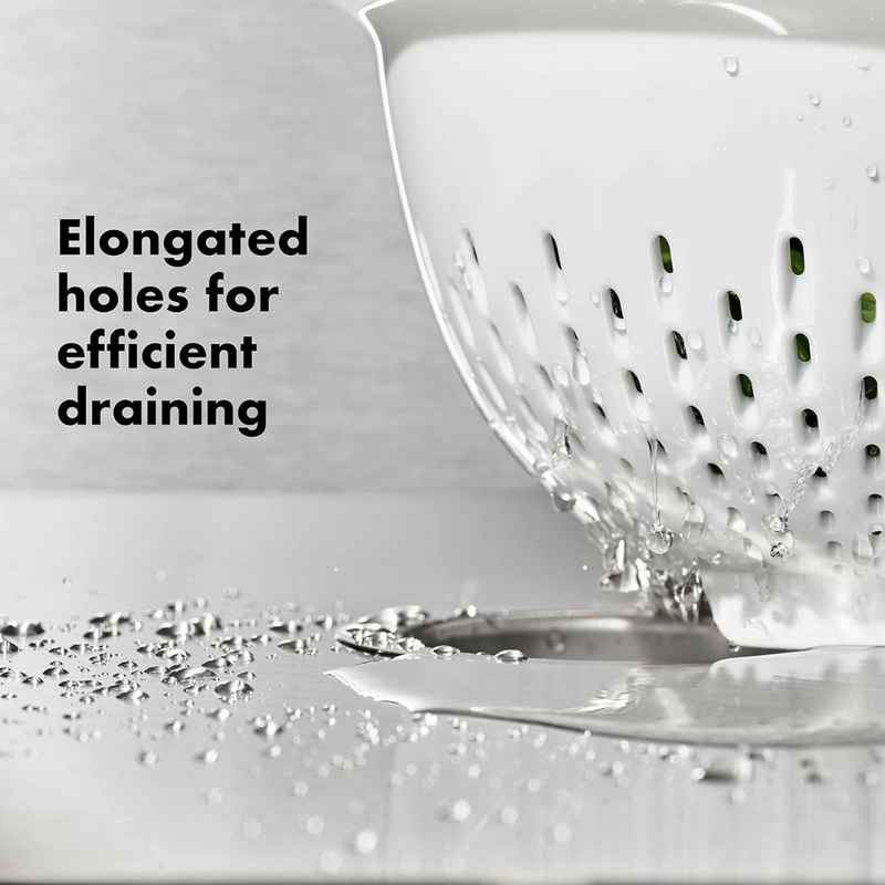 OXO Good Grips Colander with perforated holes, elevated base, and soft non-slip handles.
