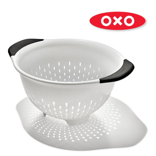 OXO Good Grips Colander with perforated holes, elevated base, and soft non-slip handles.