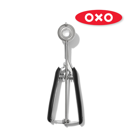 OXO Good Grips Medium Cookie Scoop with stainless steel head and soft spring-loaded non-slip handle.