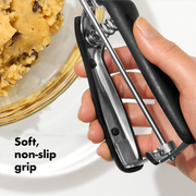 OXO Good Grips Medium Cookie Scoop with stainless steel head and soft spring-loaded non-slip handle.