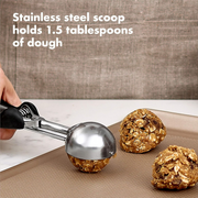 OXO Good Grips Medium Cookie Scoop with stainless steel head and soft spring-loaded non-slip handle.
