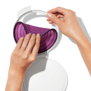OXO Good Grips Cut & Keep Silicone Onion Saver with purple silicone lid and clear base