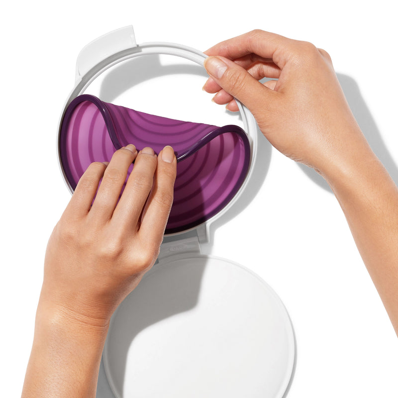 OXO Good Grips Cut & Keep Silicone Onion Saver with purple silicone lid and clear base