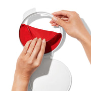 OXO Good Grips Cut & Keep Silicone Tomato Saver with red silicone lid and clear base