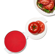 OXO Good Grips Cut & Keep Silicone Tomato Saver with red silicone lid and clear base