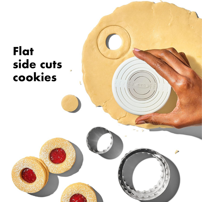 OXO Good Grips Dual Cookie & Biscuit Cutters set with smooth and scalloped stainless steel edges and non-slip handles.