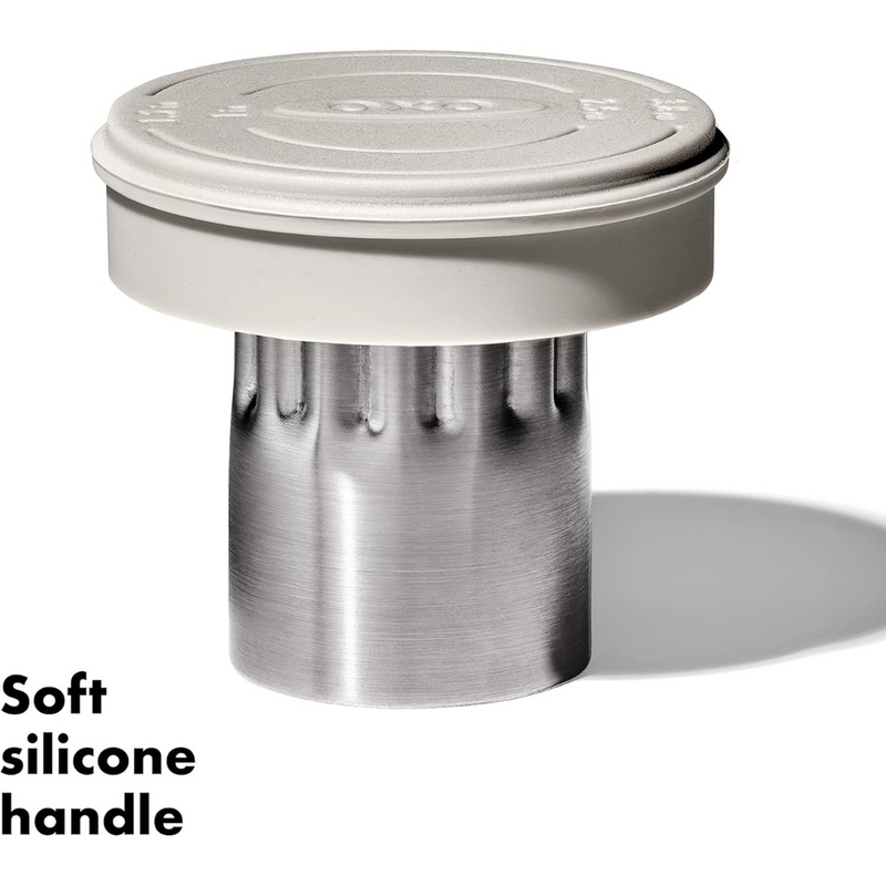 OXO Good Grips Dual Cookie & Biscuit Cutters set with smooth and scalloped stainless steel edges and non-slip handles.