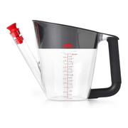 OXO Good Grips Fat Separator 4 Cup / 1L with strainer, stopper, and clear measurement markings.