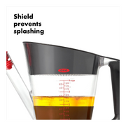 OXO Good Grips Fat Separator 4 Cup / 1L with strainer, stopper, and clear measurement markings.