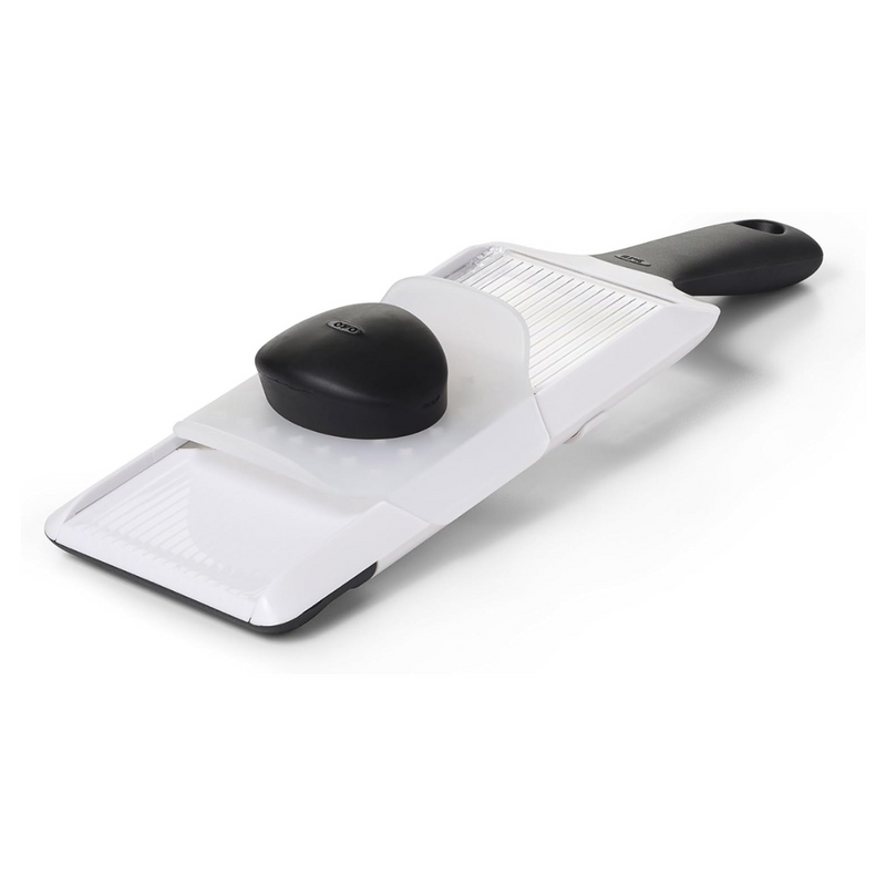 OXO Good Grips Hand-Held Mandoline Slicer with adjustable stainless steel blade and non-slip handle for precise fruit and vegetable slicing.