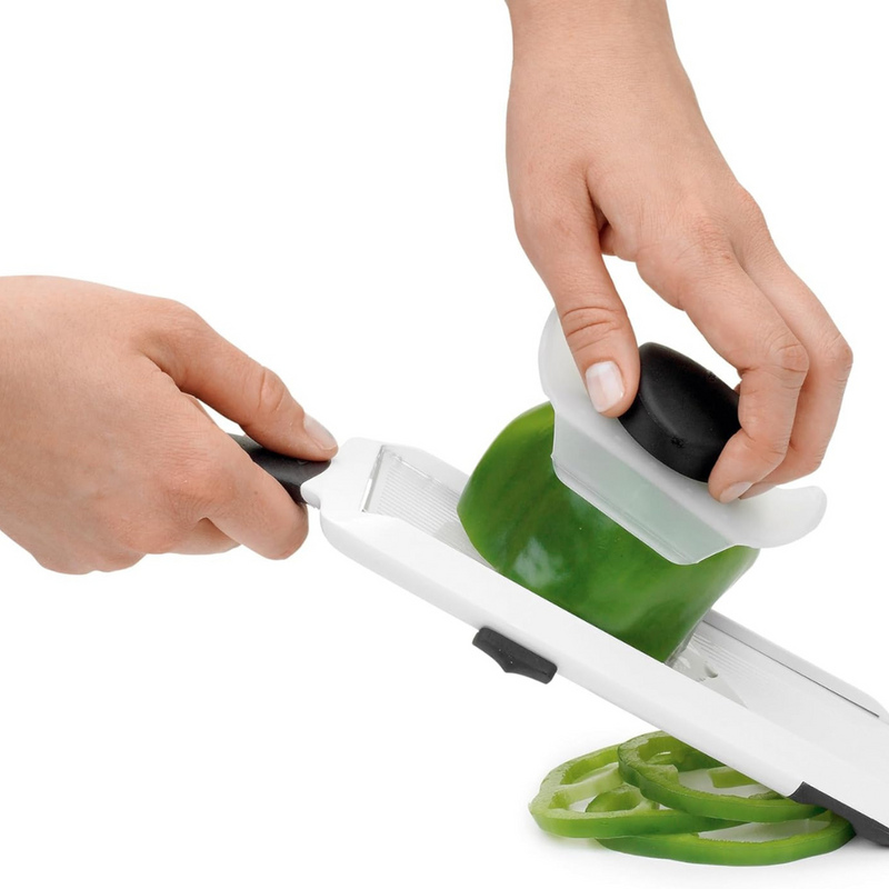 OXO Good Grips Hand-Held Mandoline Slicer with adjustable stainless steel blade and non-slip handle for precise fruit and vegetable slicing.