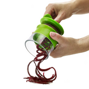 OXO Good Grips Hand-Held Spiralizer with black handle and green body