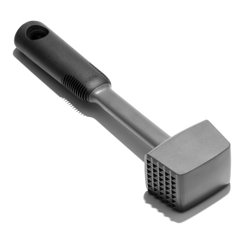 OXO Good Grips Meat Tenderizer with dual-sided aluminum head and soft non-slip handle.