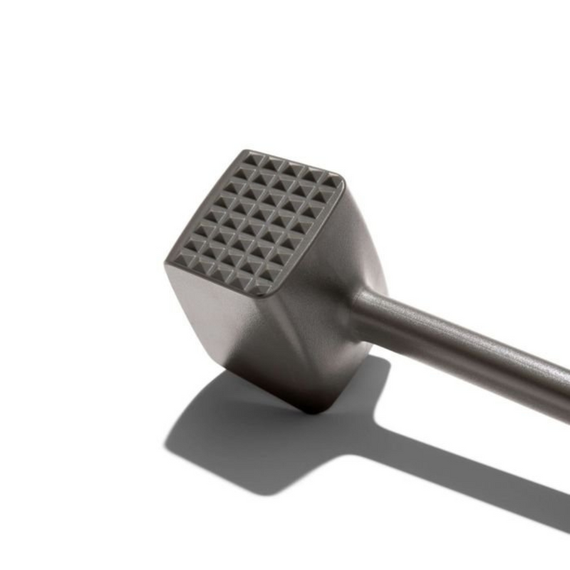 OXO Good Grips Meat Tenderizer with dual-sided aluminum head and soft non-slip handle.