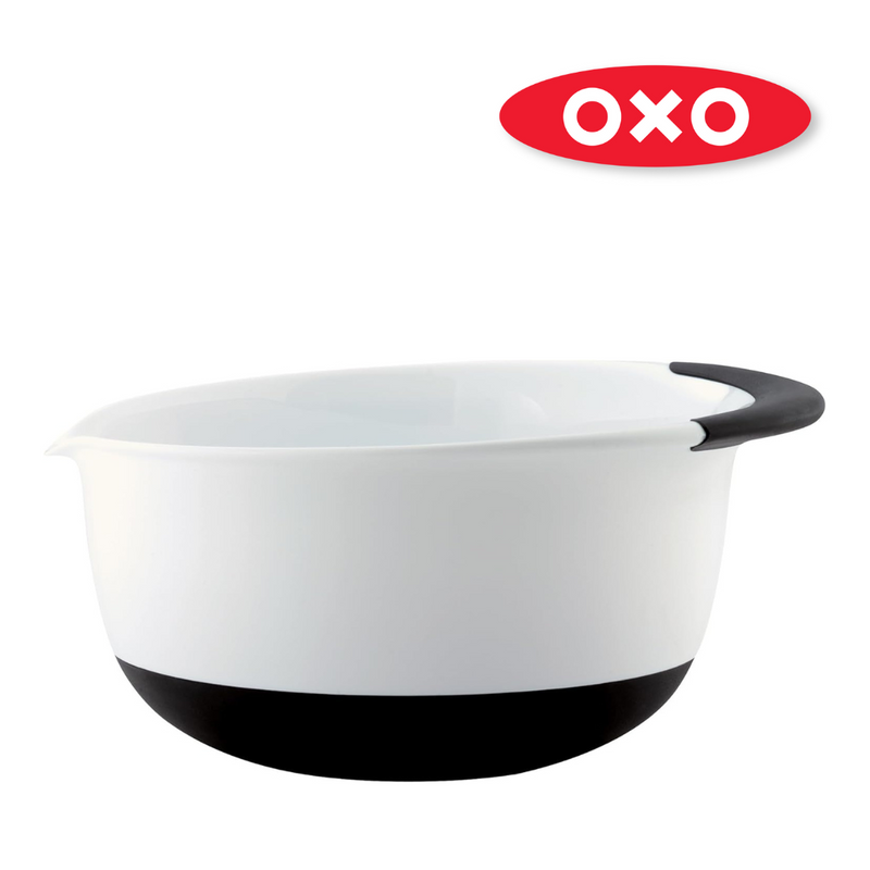 OXO Good Grips Mixing Bowl with non-slip base and handle for stable, comfortable mixing.