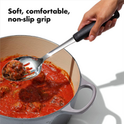 OXO Good Grips Polished Stainless Steel Slotted Spoon with deep slotted bowl and soft non-slip handle.