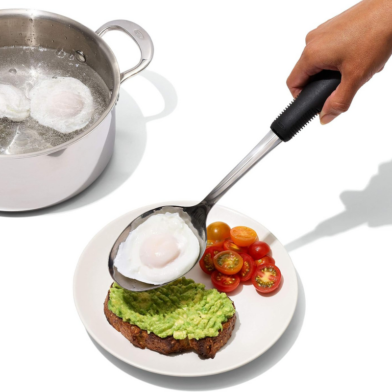 OXO Good Grips Polished Stainless Steel Slotted Spoon with deep slotted bowl and soft non-slip handle.
