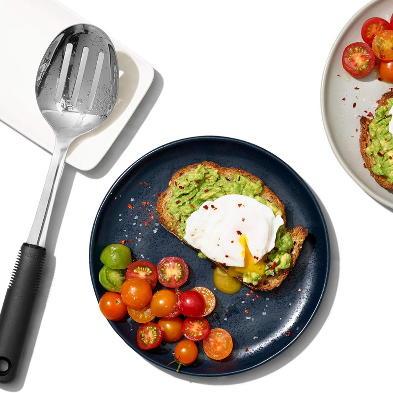 OXO Good Grips Polished Stainless Steel Slotted Spoon with deep slotted bowl and soft non-slip handle.