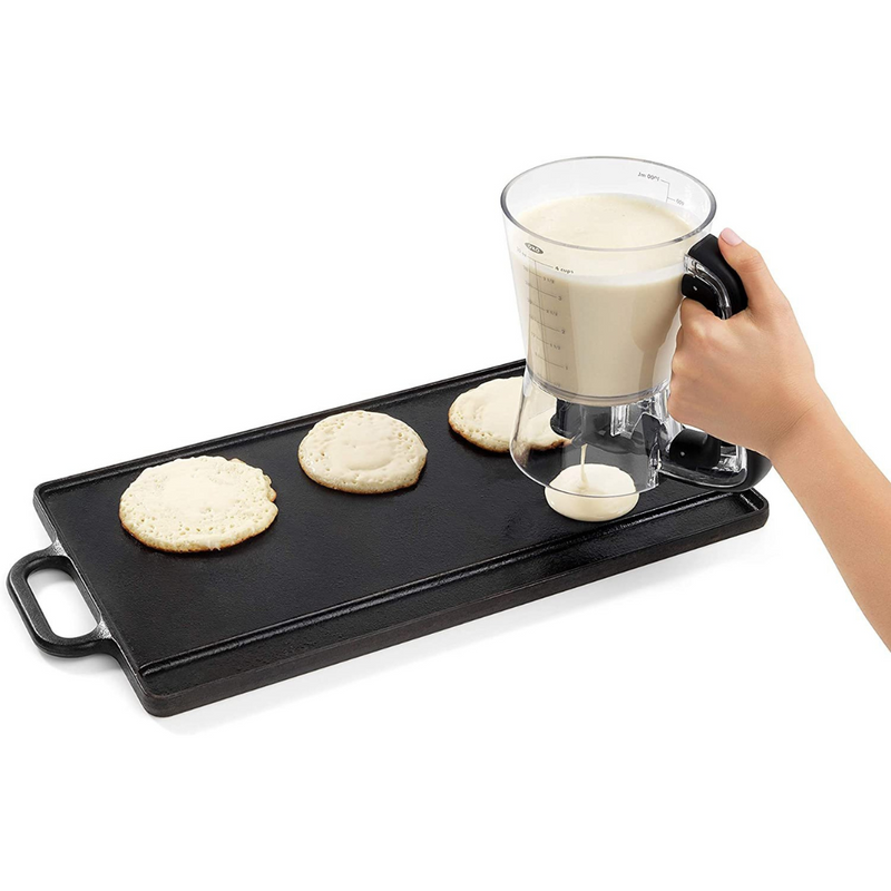 OXO Good Grips Precision Batter Dispenser with drip-free valve, measurement markings, and non-slip handle.