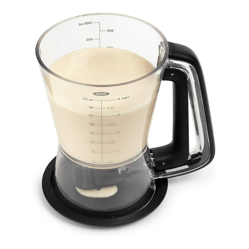 OXO Good Grips Precision Batter Dispenser with drip-free valve, measurement markings, and non-slip handle.