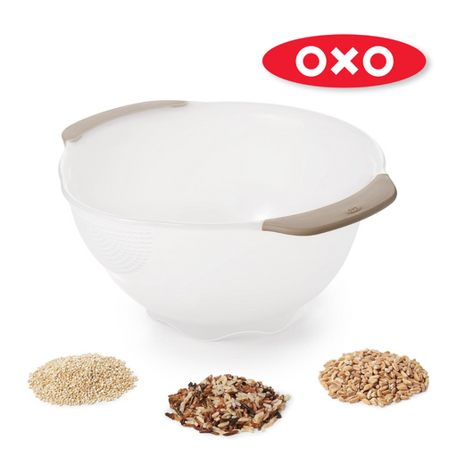 OXO Good Grips Rice and Grain Washing Colander with fine drainage holes and soft non-slip handles.