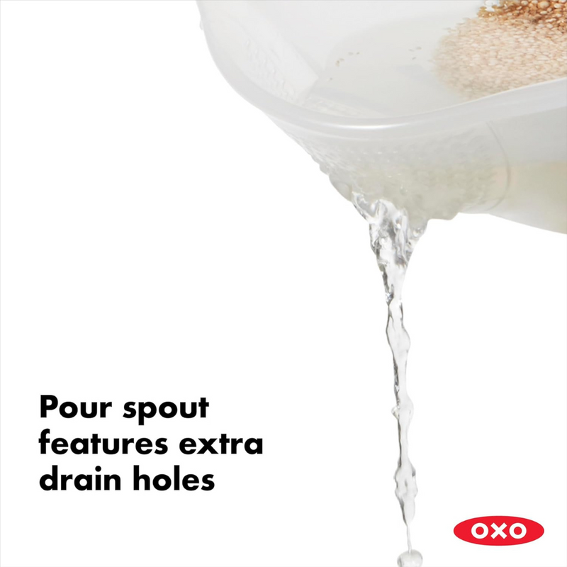 OXO Good Grips Rice and Grain Washing Colander with fine drainage holes and soft non-slip handles.