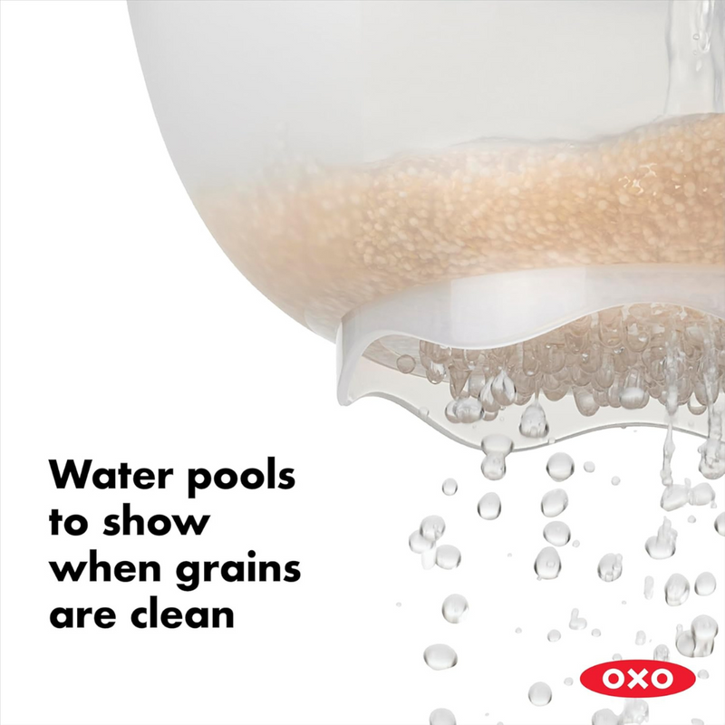 OXO Good Grips Rice and Grain Washing Colander with fine drainage holes and soft non-slip handles.