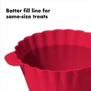 OXO Good Grips Silicone Baking Cups 12-Pack in assorted colours with non-stick interior and batter fill line.