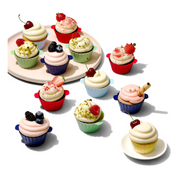 OXO Good Grips Silicone Baking Cups 12-Pack in assorted colours with non-stick interior and batter fill line.