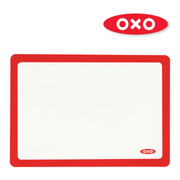 OXO Good Grips Silicone Baking Mat with measurement markings, non-stick surface, and half-sheet pan fit.