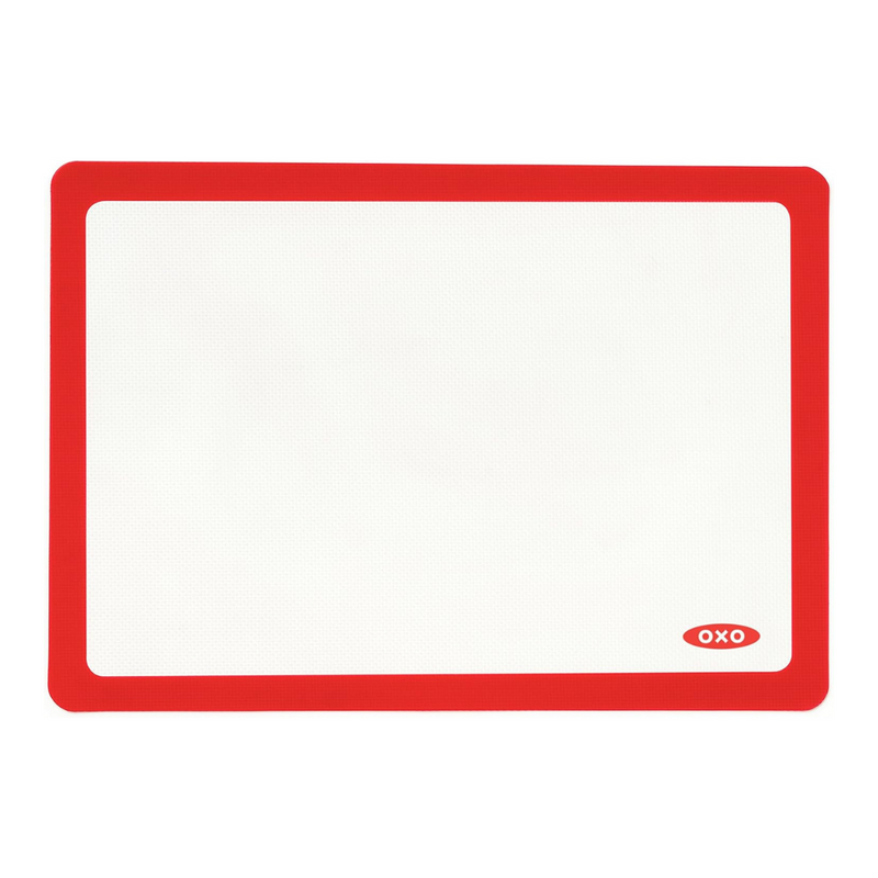 OXO Good Grips Silicone Baking Mat with measurement markings, non-stick surface, and half-sheet pan fit.