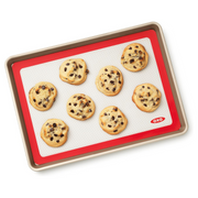 OXO Good Grips Silicone Baking Mat with measurement markings, non-stick surface, and half-sheet pan fit.