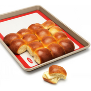 OXO Good Grips Silicone Baking Mat with measurement markings, non-stick surface, and half-sheet pan fit.