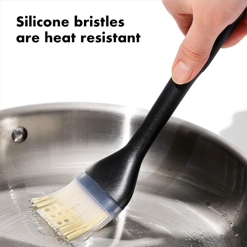 OXO Good Grips Silicone Basting Brush with heat-resistant bristles and non-slip handle for even sauce coating.